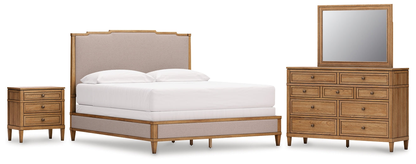 Sharlance California King Upholstered Panel Bed with Mirrored Dresser and Nightstand